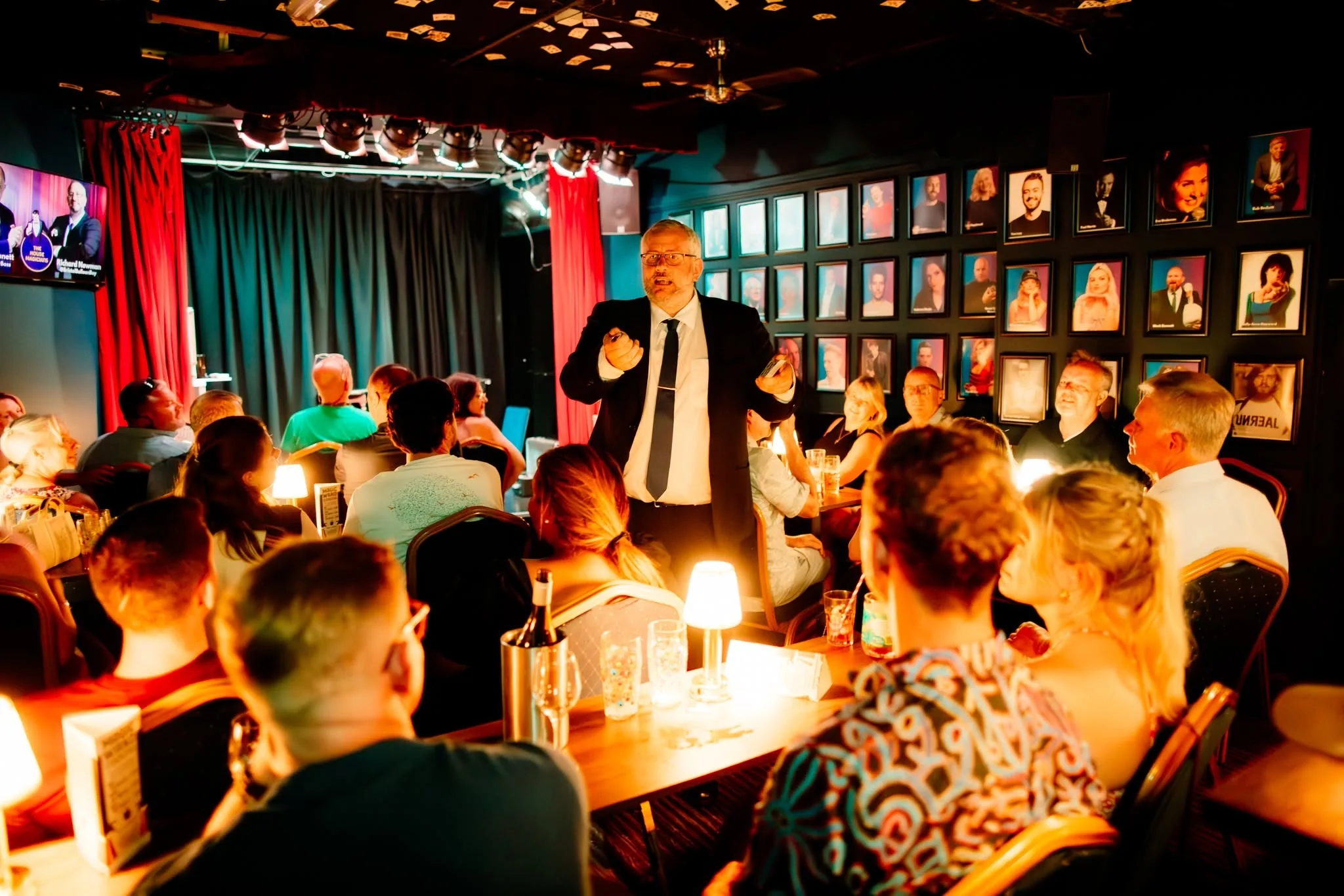 Audience enjoying a parlour and cabaret magic performance