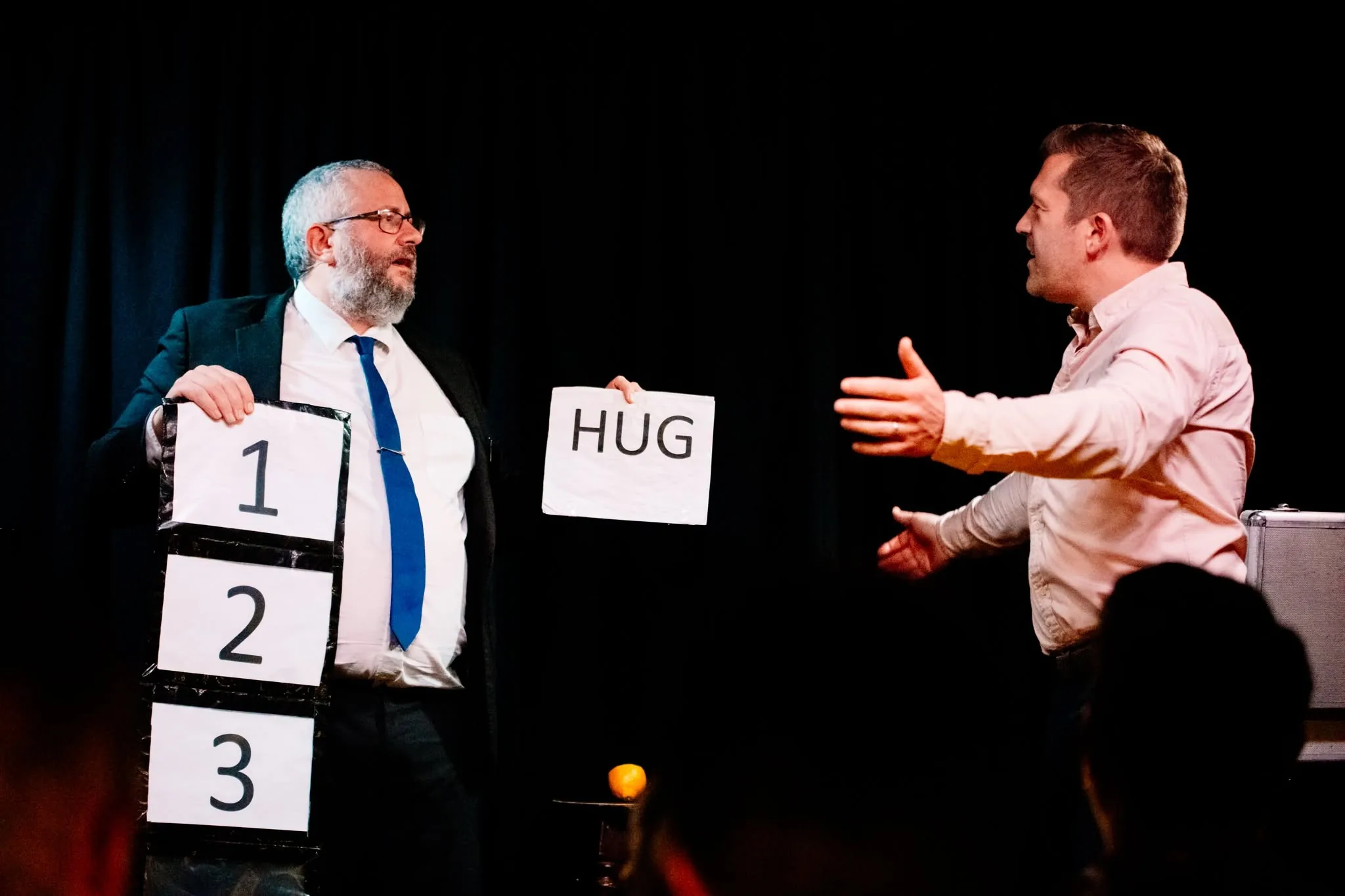 Rich Newman sharing a magical moment with an audience member